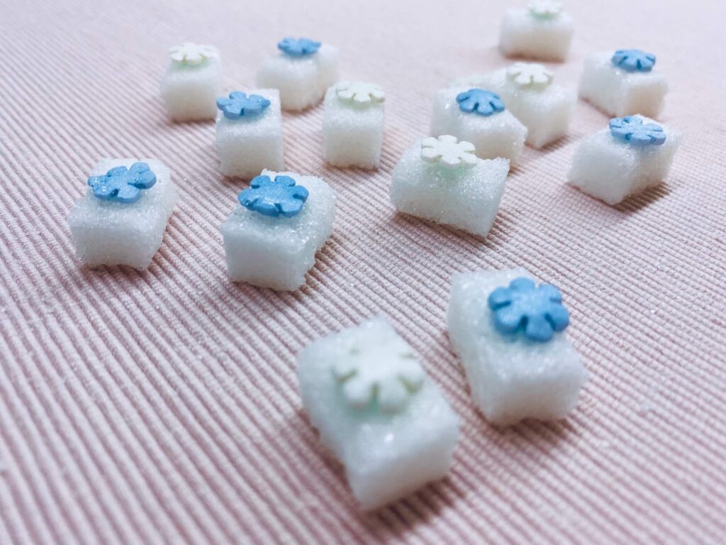 Zuckerwürfel mit Schneeflocken